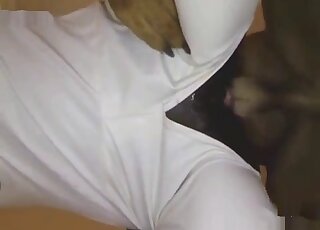 Good ebony in a white outfit fucked by a big brown dog
